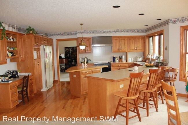 Building Photo - 4 br, 2.5 bath House - 6049 Paw Paw Lake Rd