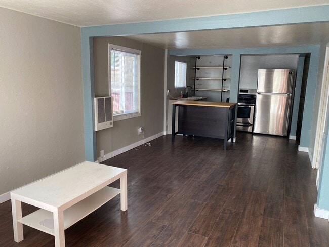 Photo - Little cottage nestled in a street surroun... House