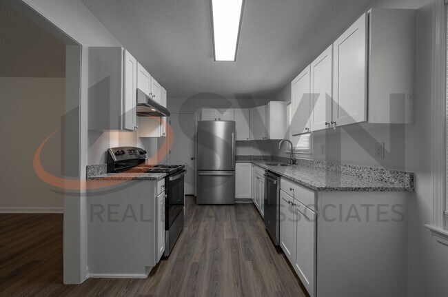 Foto del edificio - Enjoy Modern Living in This Beautifully Updated 3BR, 1.5BA Durham Home!