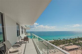 Building Photo - 9801 Collins Ave