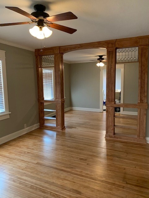 Completly refinished hardwood floors in living/dining/2 bedrooms, custom trim, leaded glass transoms - 607 W Duncan Dr