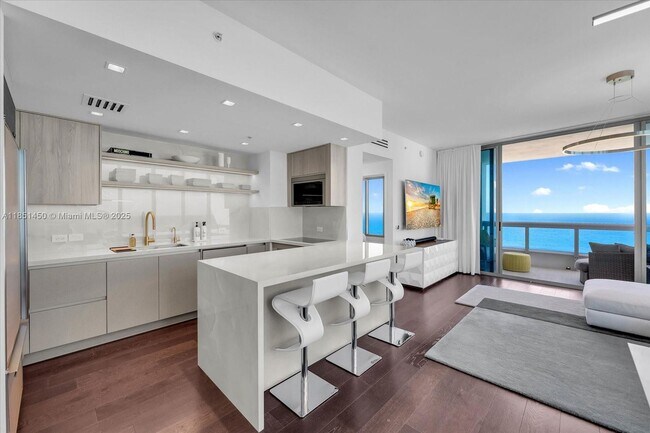 Building Photo - 6899 Collins Ave