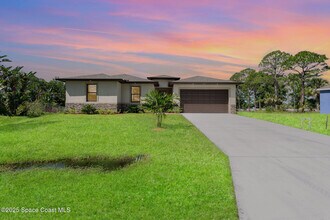Building Photo - 3187 Topsey Ave SE