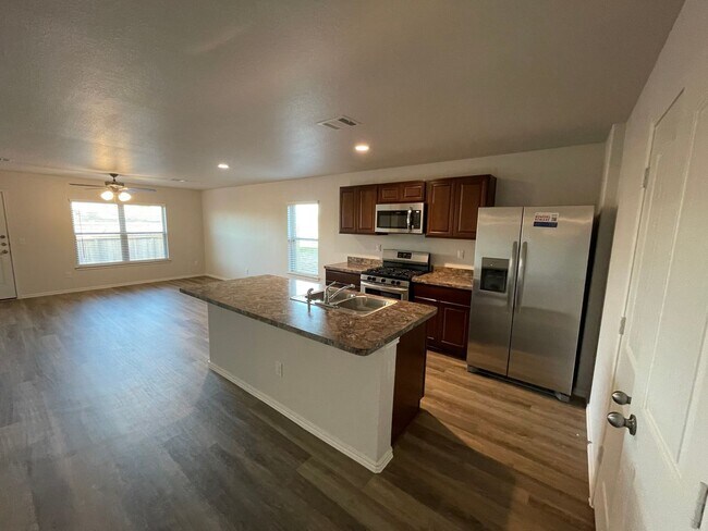 Building Photo - *Half Off First Month's Rent!* Charming 4 Bedroom, 2 Bath Home in Magnolia Ridge!