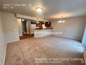 Building Photo - 2406 E 52nd Ave