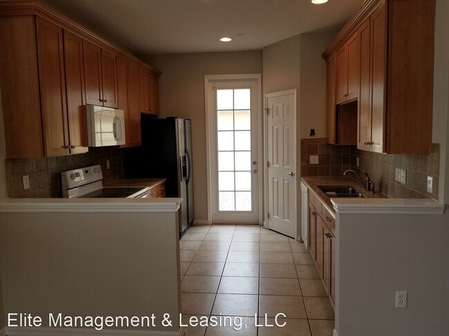 Foto del edificio - 4 br, 3 bath House - 9101 Camden Gardens St.