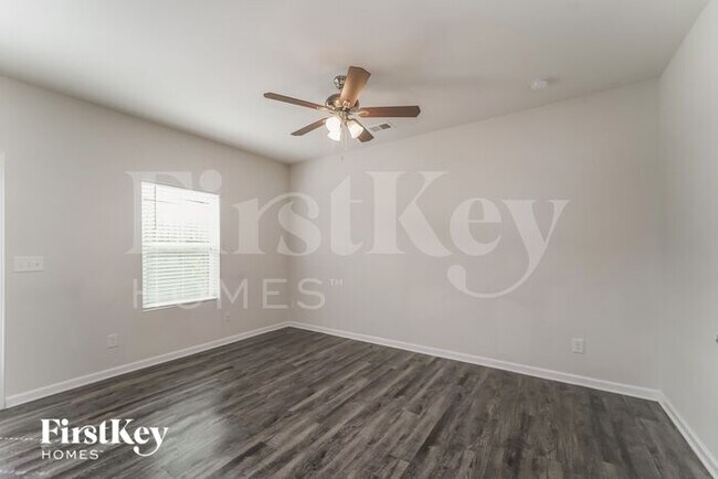 Foto del edificio - 10714 Rivergate Dr NW