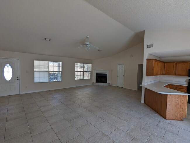 Living room with fireplace - 115 Tam O Shanter Ct