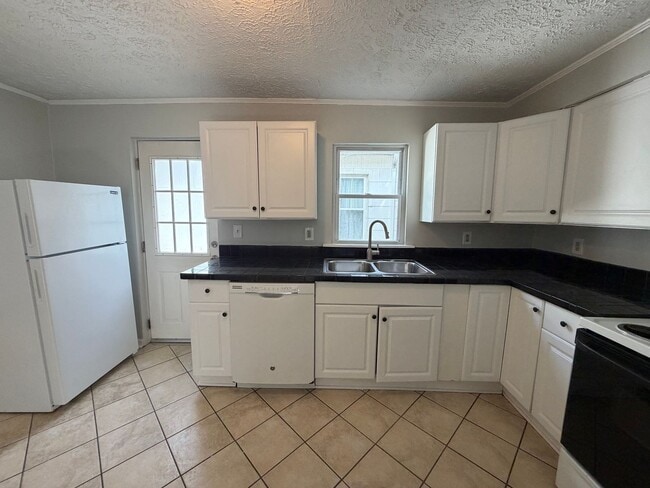 Building Photo - Charming West Side Home with Covered Porch & First-Floor Laundry