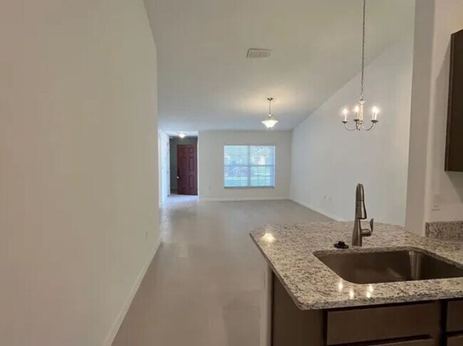 Building Photo - Brand new construction Charming 4BR 2BA in...