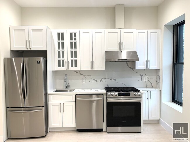 Building Photo - EXCLUSIVE BED-STUY BROWNSTONE GARDEN  FLOO...