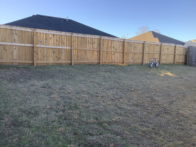 Backyard fence directly behind house - 431 Firewood Dr