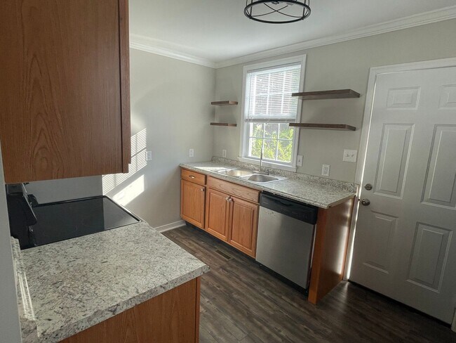 Building Photo - Coming Soon: Charming 3BR Home with Private Backyard