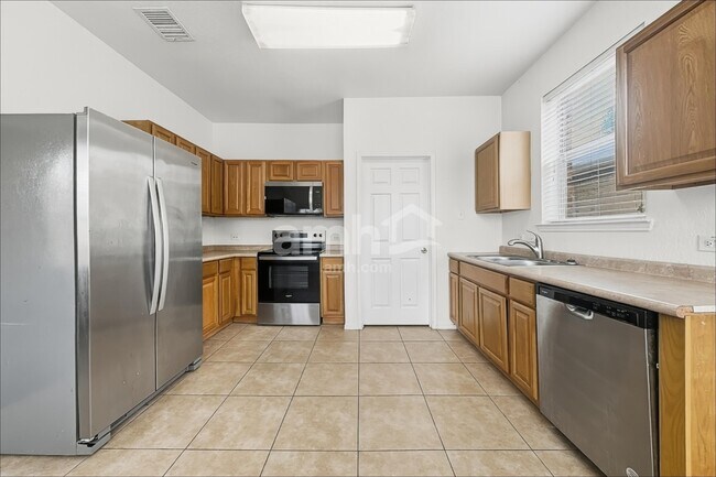 Foto del edificio - 11909 Grizzly Bear Dr