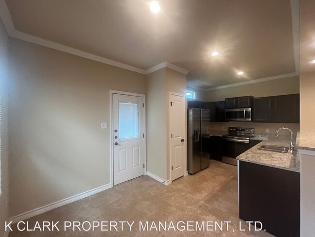 Building Photo - 3 br, 2.5 bath House - 6419 LUGLIO LANE  #101