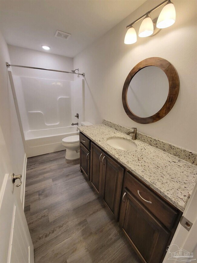 Foto del edificio - 5221 Gaineswood Dr