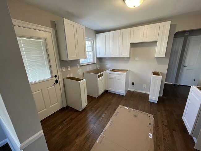 New kitchen awaiting appliances and countertops - 4331 Orchard Ln