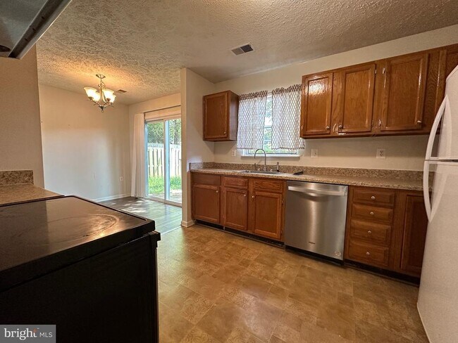 Building Photo - 8625 Cartwright Ct