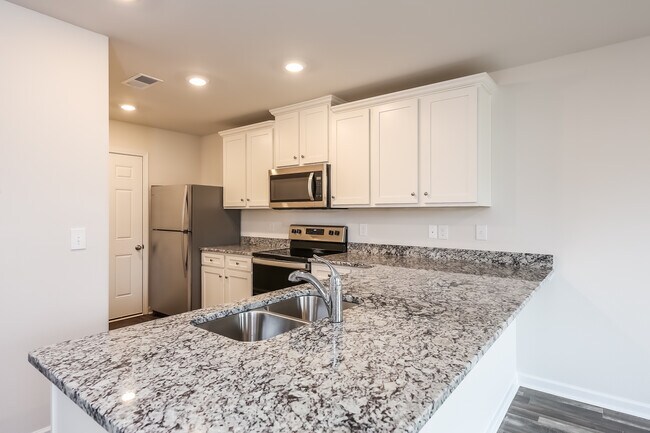 Building Photo - 6025 Mason Tucker Dr