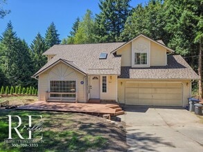 Building Photo - 7665 NE Clover Blossom Ln