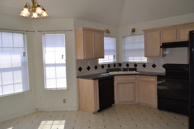 Building Photo - All brick beauty with fireplace and fenced...