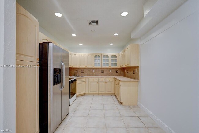 Building Photo - 4 br, 2 bath House - 6410 SW 2nd St # A