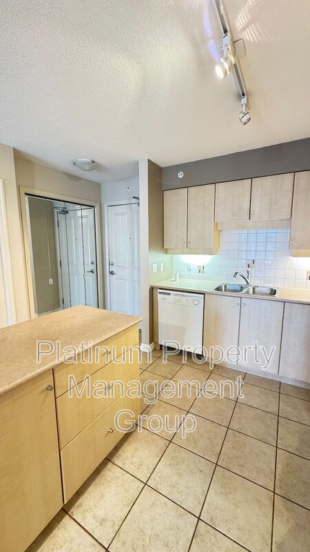 Photo du bâtiment - 650-1510 10 St SW