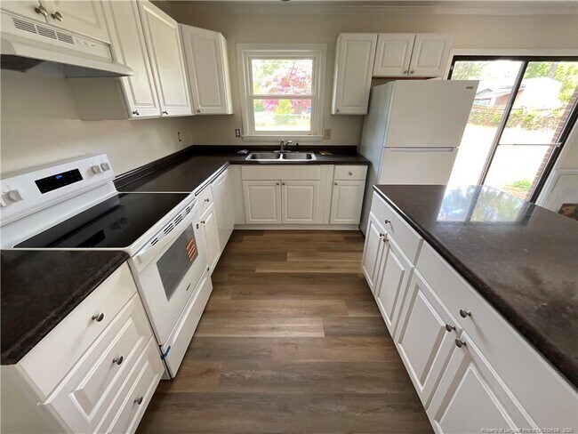 Building Photo - 5909 McDougal Dr