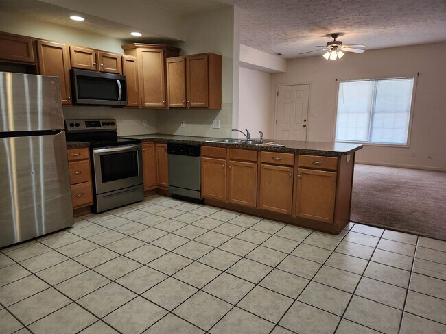 Building Photo - Cornerstone Townhomes-Convenient to the Ti...