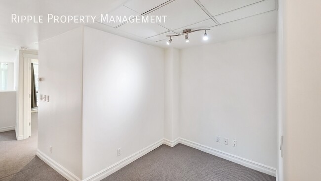 Building Photo - SOPHISTICATED 1-BED + DEN CONDO AT EMERALD STONE | MASSIVE PRIVATE PATIO & AC