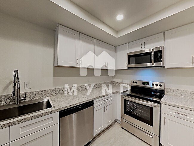 Building Photo - 3912 60th St Unit 9