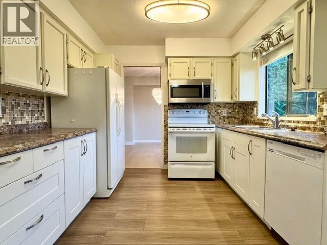 Photo du bâtiment - 5XX3 Wildwood Crescent