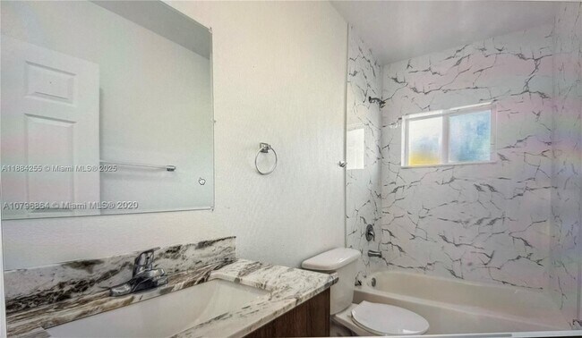 Foto del edificio - 6240 NW 22nd Ct