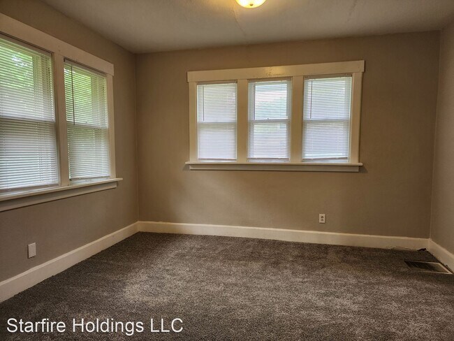 Building Photo - 4 br, 1 bath House - 1128 Martin Luther Ki...