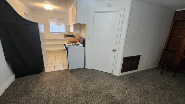 living room to kitchen - 152 N Spring St