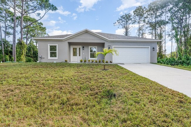 Building Photo - BRAND NEW! 4/2 PALM BAY!