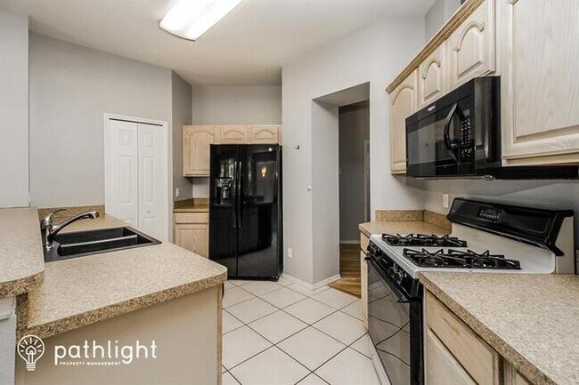 Building Photo - 5690 Magnolia Bloom Terrace