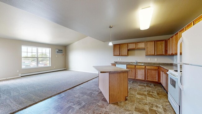 1 Bedroom pic from Hall entry - Custer Crossing & Ravenwood Apartments