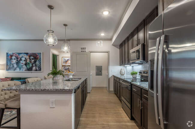 2BR, 2BA - 1,067 SF - Kitchen - Evolve Champions