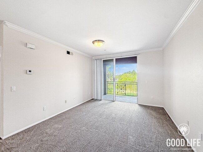 Building Photo - Bright 2BR/2BA Condo with Balcony, Garage & Resort-Style Amenities in Carmel Valley!