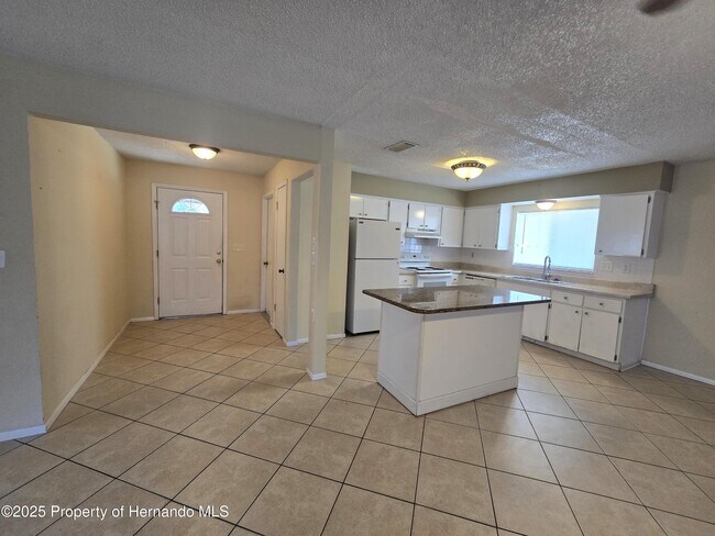 Foto del edificio - 8915 Woodmill Dr