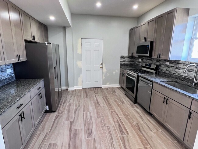 Foto del edificio - 4244 N Spaulding Ave