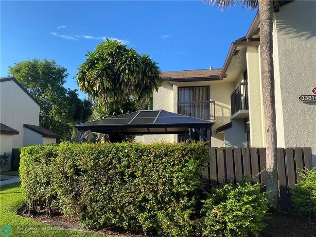 Building Photo - 3385 Cocoplum Cir