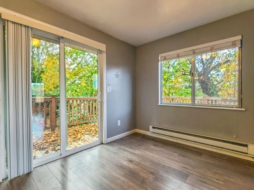 Building Photo - AVAILABLE NOW! Charming West Seattle Home featuring a garage, spacious deck, and wood-burning fir...