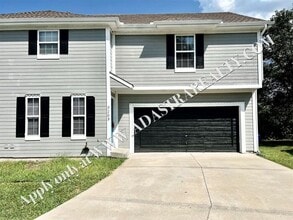 Building Photo - 5205 Woodland Dr