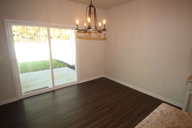 Dining Room open to family and kitchen area with access to large patio and fu - 3406 Dropseed Dr