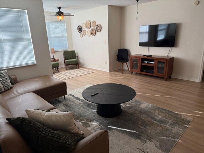 Living Room and Solarium - River Park Apartments