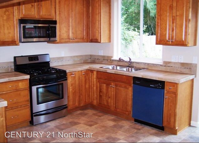 Building Photo - 4 br, 2.5 bath House - 3044 SW Lanterna Pl