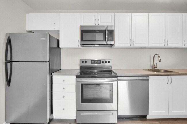 Photo du bâtiment - Riverstone Place & Millstone Place