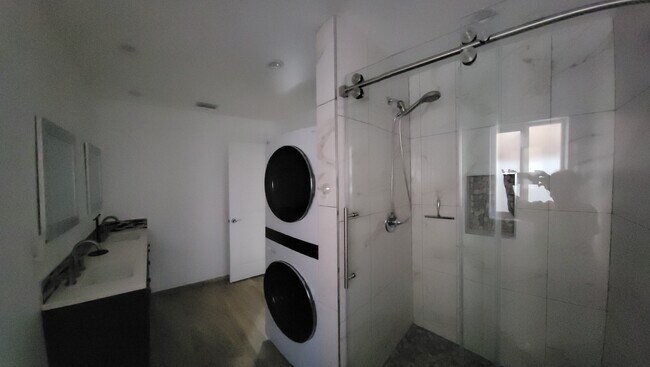 Bathroom with new washer/dryer included. - 3635 Montrose Ave